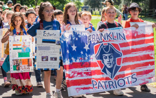 Cultural Parade 2024. Franklin Elementary students marching.
